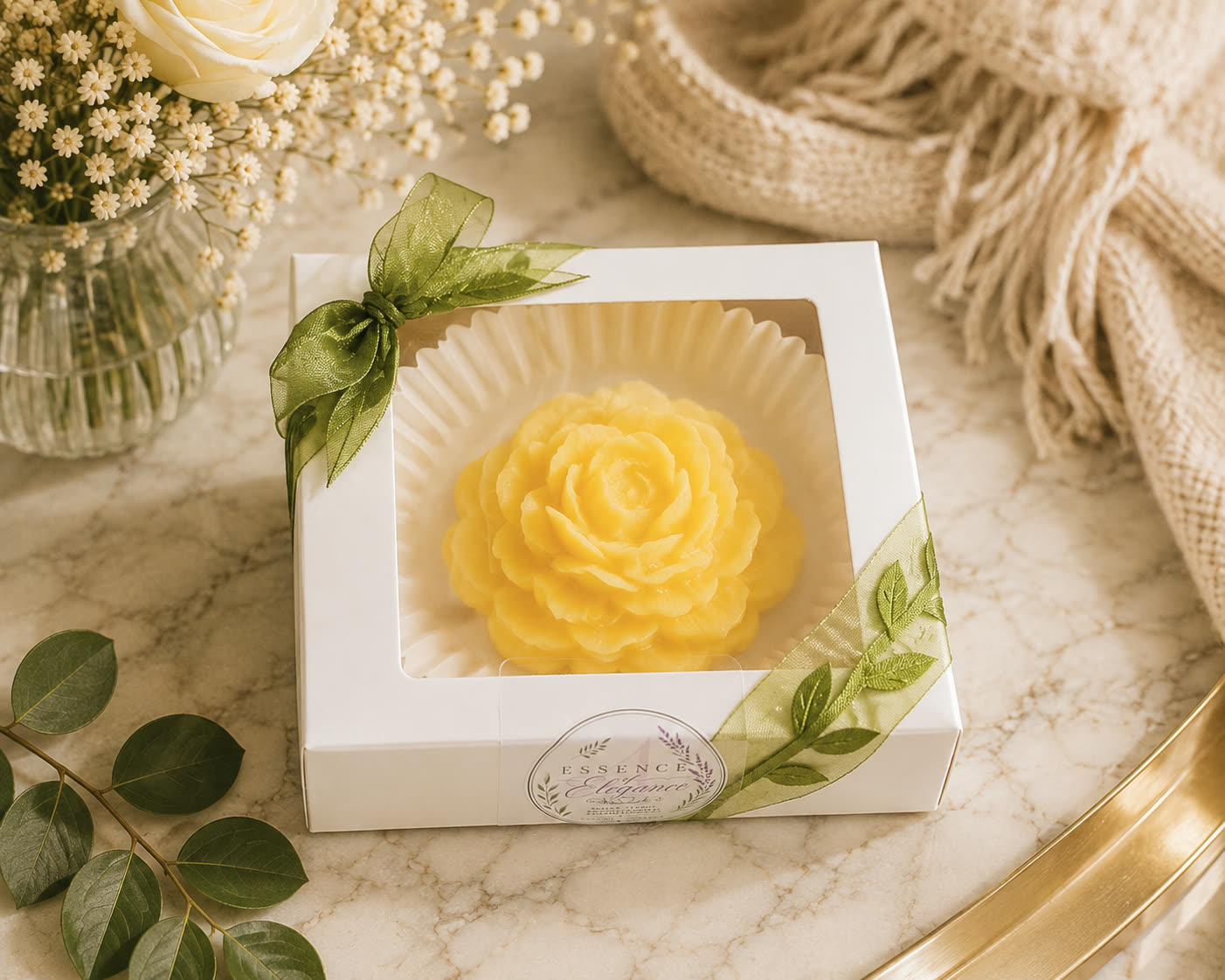 Essence of Elegance wax melt in a white window gift box tied with sage ribbon